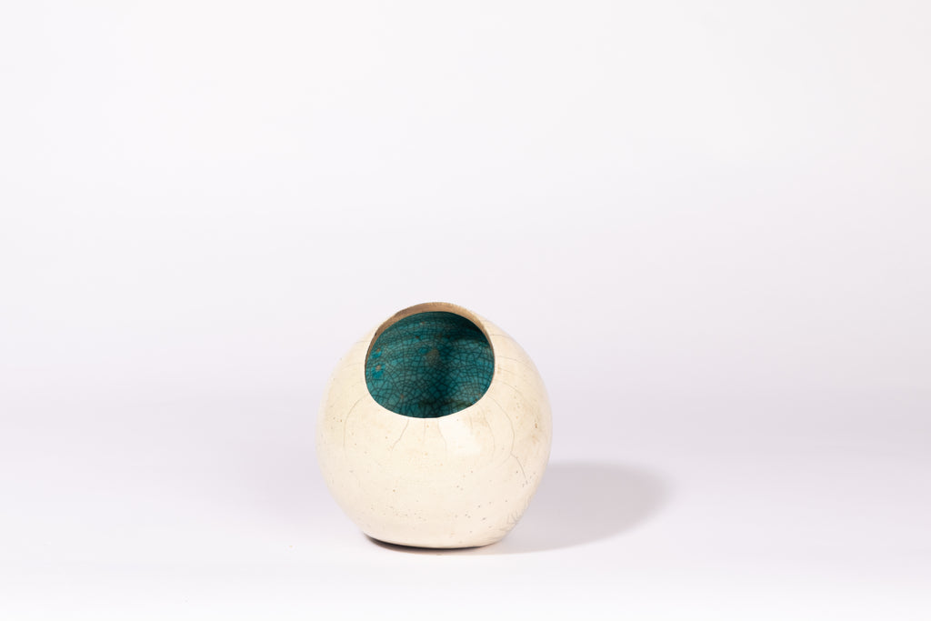 Eyeball raku vessel